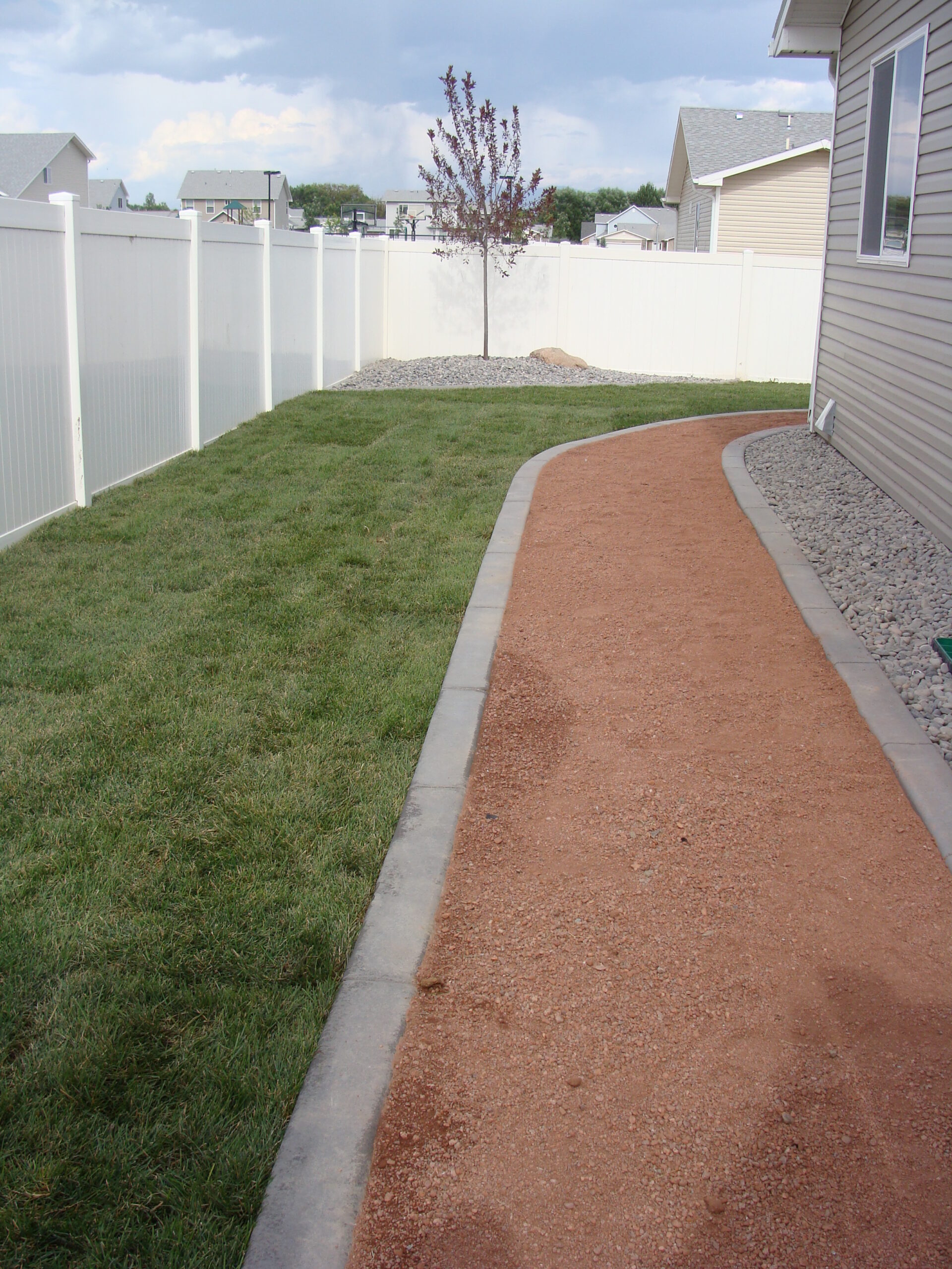 Concrete Curbing Designer Lawn Edging Woody's Landscapes Libby, Montana